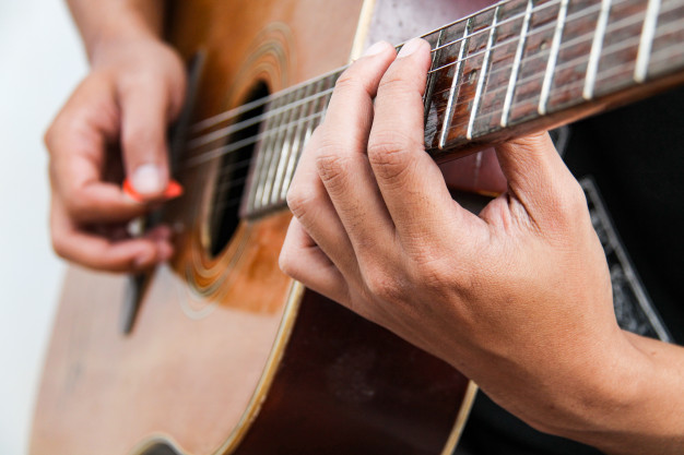 MUSICO GUITARRA ILUSTRATIVA